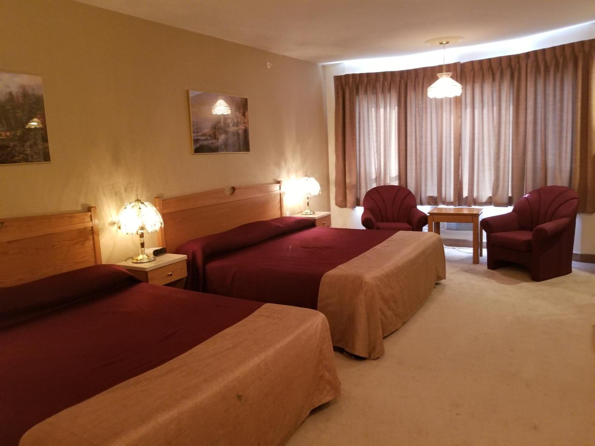 New Imperial Suites Whitecourt Bagian luar foto