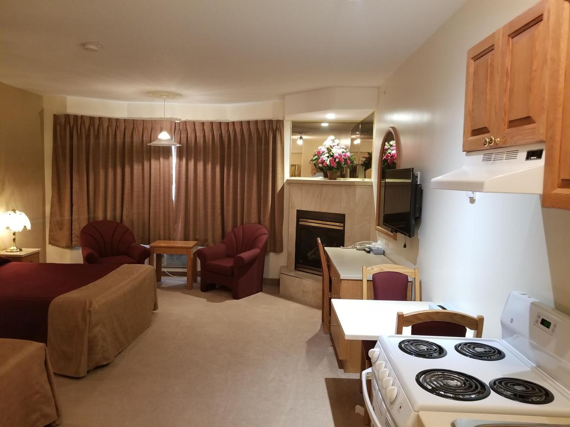 New Imperial Suites Whitecourt Bagian luar foto