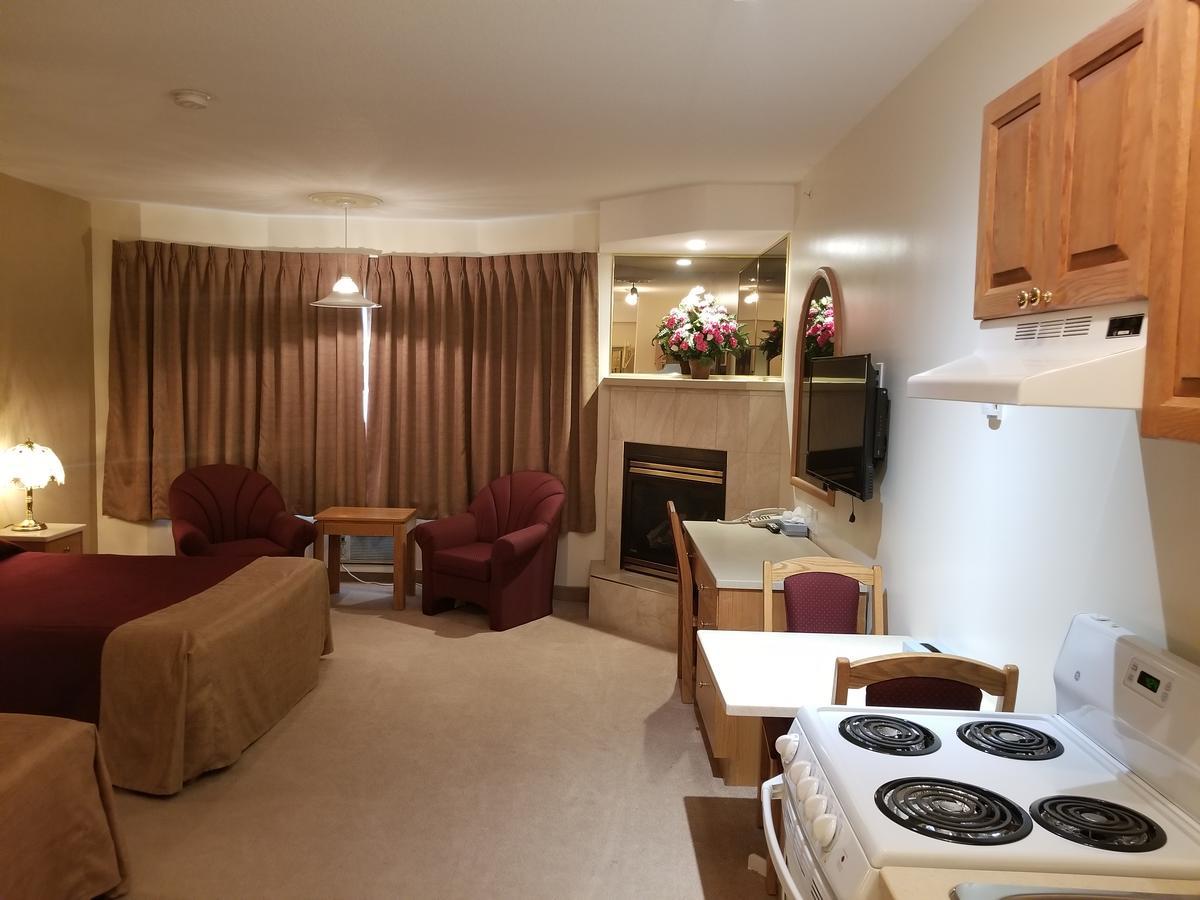 New Imperial Suites Whitecourt Bagian luar foto