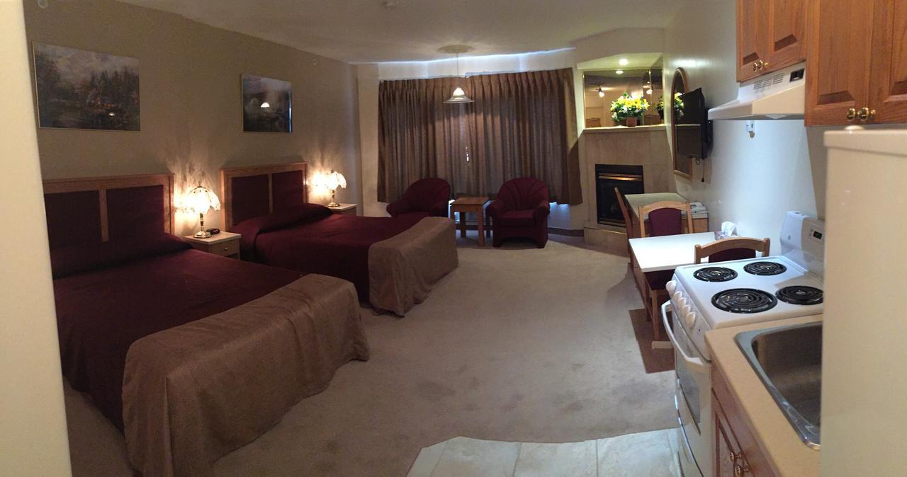 New Imperial Suites Whitecourt Bagian luar foto