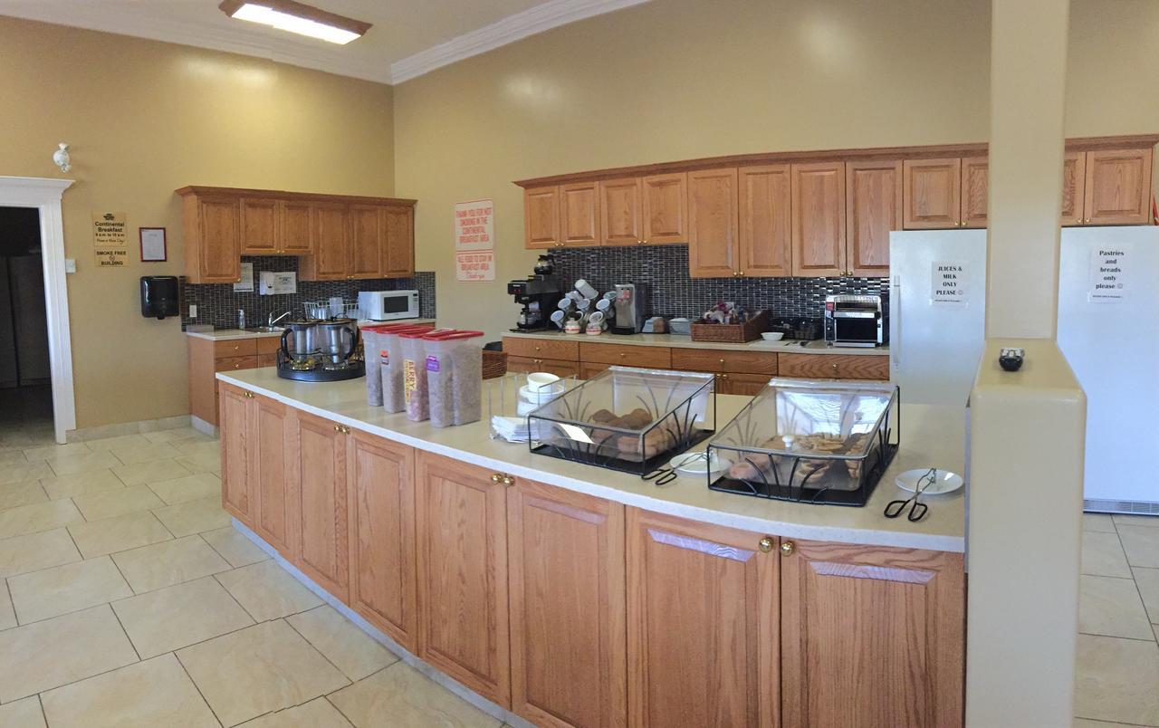 New Imperial Suites Whitecourt Bagian luar foto